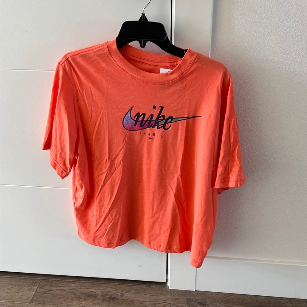 Nike Dry-fit loose tennis shirt. Women size small.